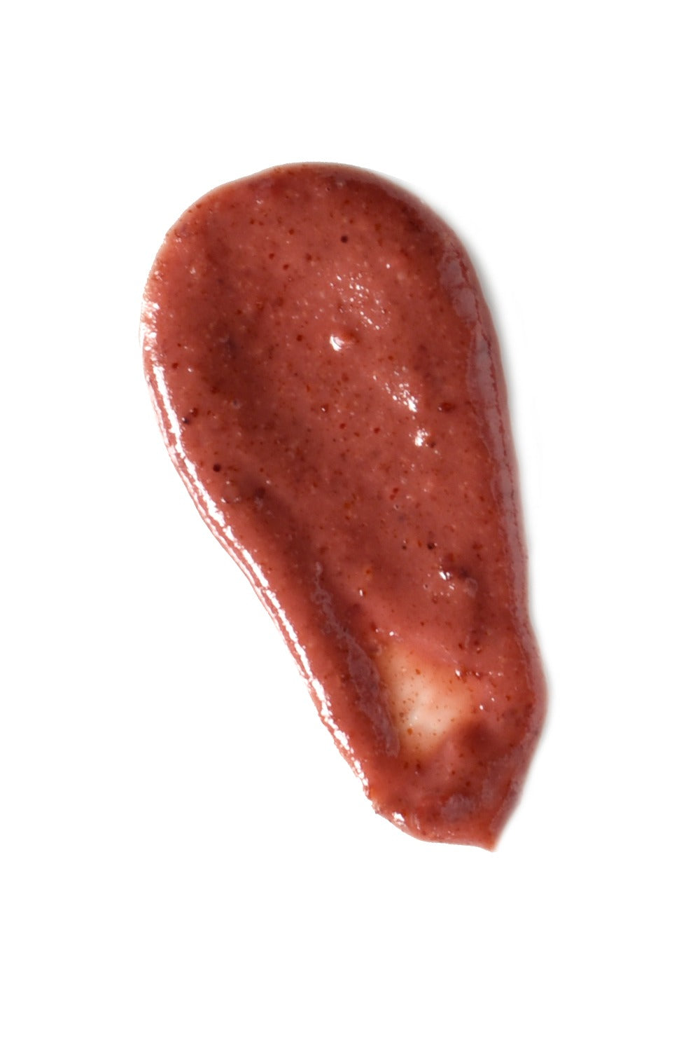 Red-brown smear of cream or paint on a white background