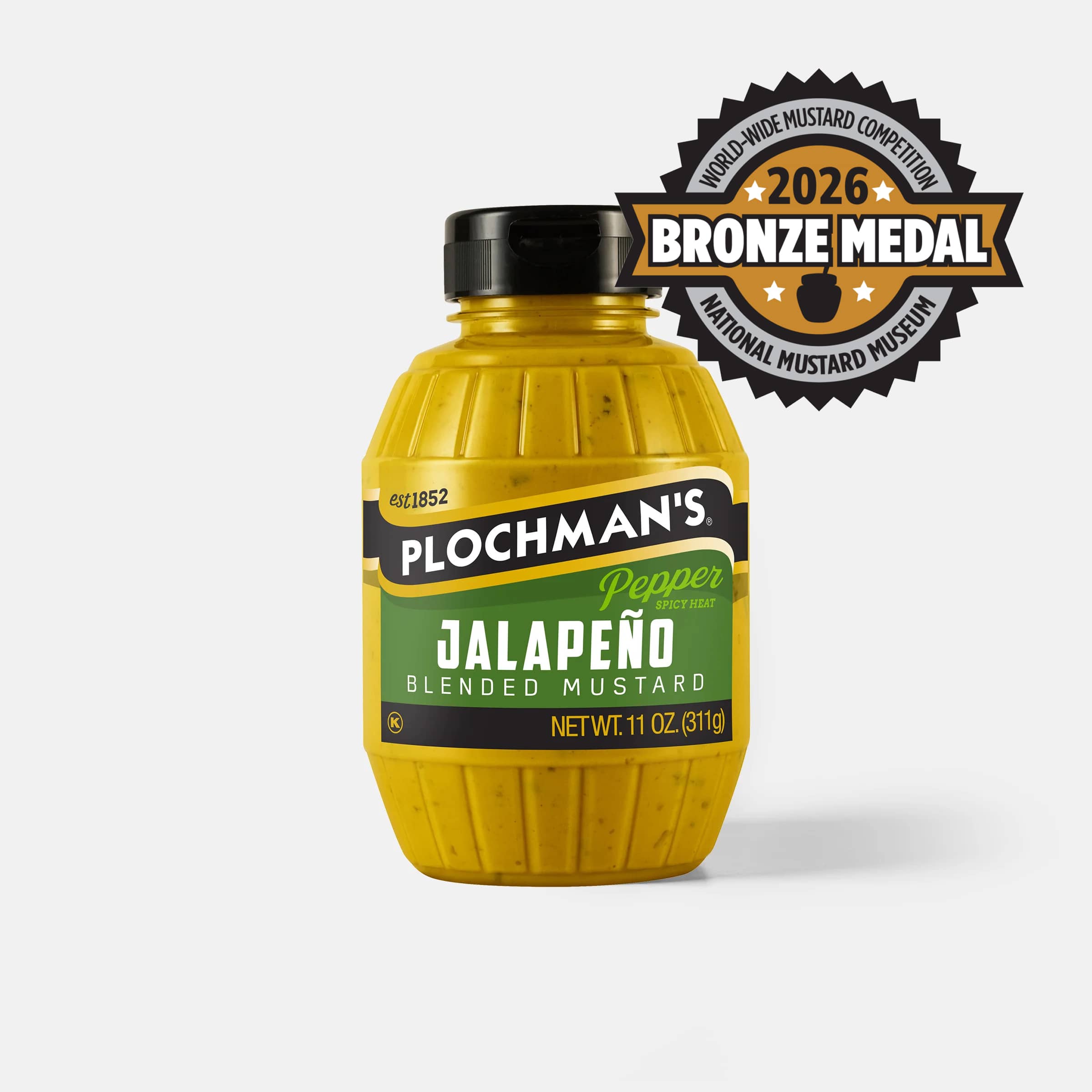 A bottle of Plochman's Jalapeño Blended Mustard with a black cap, featuring a 2026 Bronze Medal badge from the Worldwide Mustard Competition from the Mustard Museum.